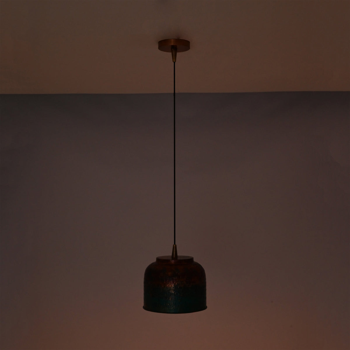 Artistic finish ceiling pendant light with black cord, copper canopy, and multicolor rounded shade design