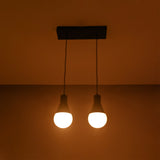 Aspen Dual Socket Pendant Chandelier Model 33242 illuminated against a dark background, showcasing warm ambient lighting.