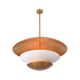 Aurelia tiered disc pendant light shown in a warm living room with layered shade design and soft ambient glow