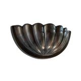 Front perspective of the Aurora modern gunmetal fluted half bowl wall sconce featuring a sculptural ribbed design with a sophisticated gunmetal finish