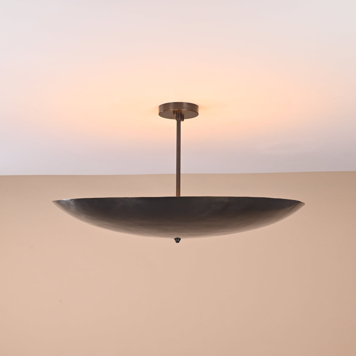 Handmade 5-light semi-flushmount brass chandelier viewed from an angle