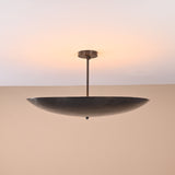 Handmade 5-light semi-flushmount brass chandelier viewed from an angle