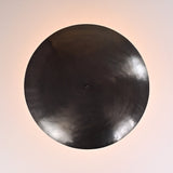Close-up of solid brass bowl ceiling light showcasing smooth satin finish
