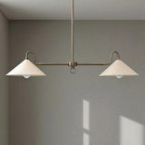 Solid brass 2-light cone chandelier illuminating a dining table with warm indirect lighting