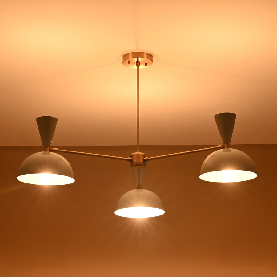 Modern brass 3-light chandelier with white bowl shades, front view, handmade by Brass Leaf Studio.