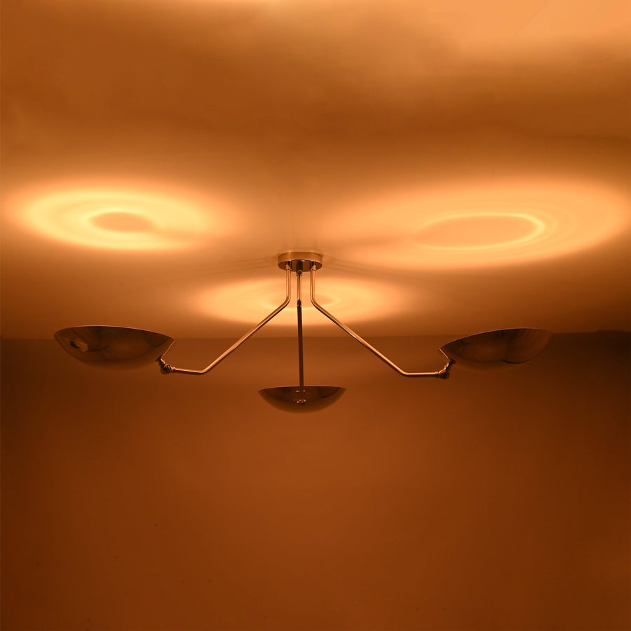 Polished chrome 3 light semi flush mount ceiling light with brass bowl shades, modern minimalist design by Brass Leaf Studio.