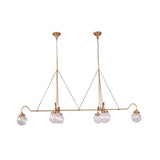 Chain suspended linear chandelier with dual ceiling canopies, brass rods, and six ribbed glass globe lights