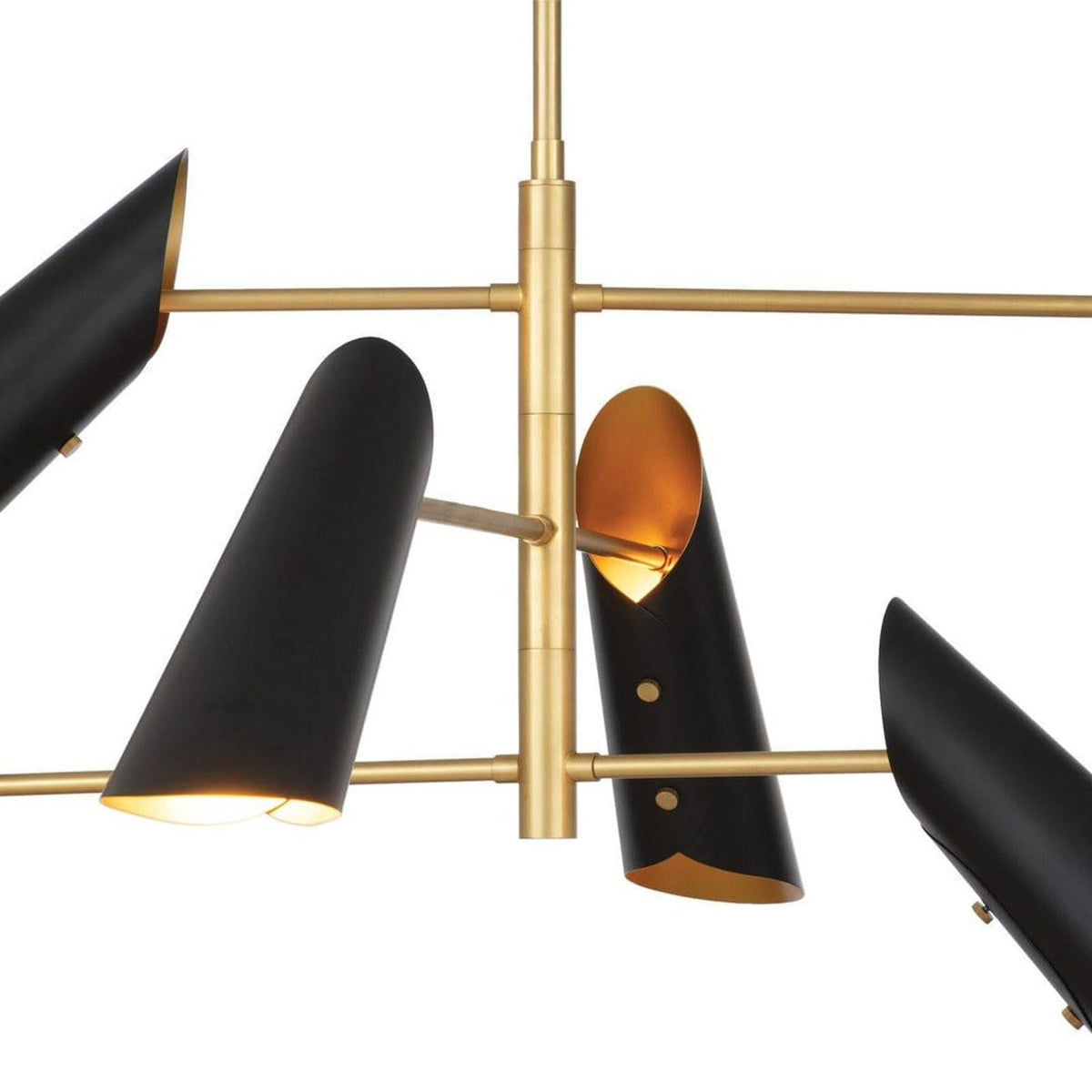 Close up of solid brass structure and black cone shades showing craftsmanship and warm interior glow