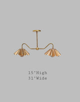 Brass double arm chandelier with wavy shades, 31 inches wide and 15 inches high
