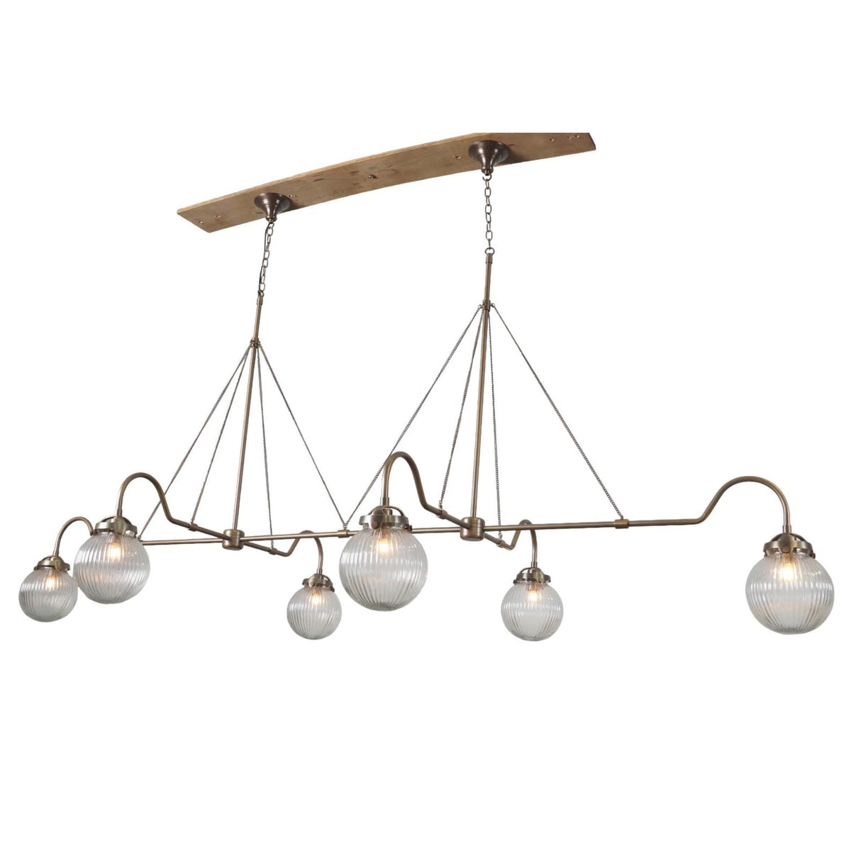 Angled view of linear 6-light brass chandelier with ribbed glass globes – elegant handmade lighting fixture by Brass Leaf Studio