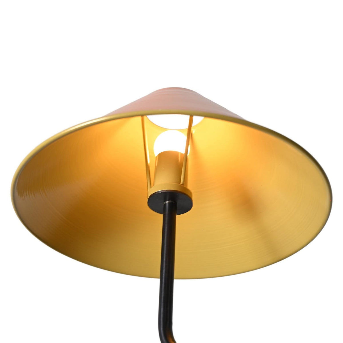 Close-up view of glowing orange cone shade with gold interior – handcrafted modern brass ceiling light by Brass Leaf Studio