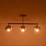 Brass Leaf Studio semi flush ceiling light with solid brass components and three dome shades for refined interiors