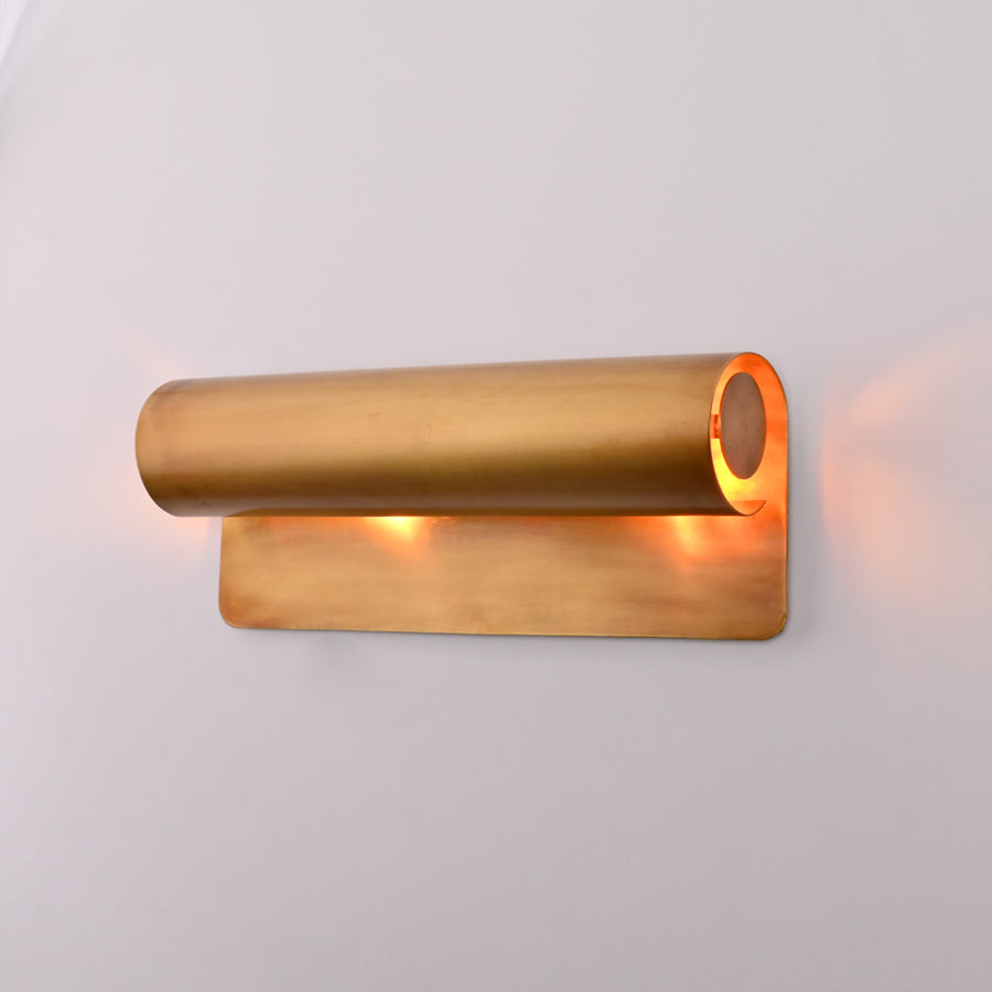 Horizontal cylinder wall light with rounded rectangular backplate and warm side glow detail