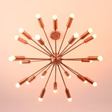 Bottom view of brass sputnik chandelier showing radial arm layout and balanced modern geometry.