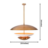 Brass tiered disc pendant light with wide upper shade, white diffuser bowl, and lower accent disc for luxury interiors