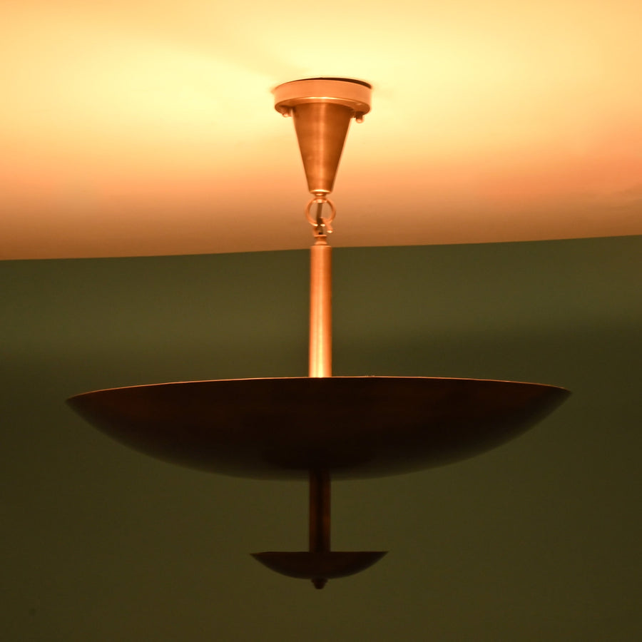 Handcrafted brushed brass bowl disc chandelier in solid brass with sculptural layered design and clean modern ceiling profile
