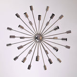 Top view of chrome Sputnik chandelier displaying 36 radiating brass arms in a modern geometric arrangement