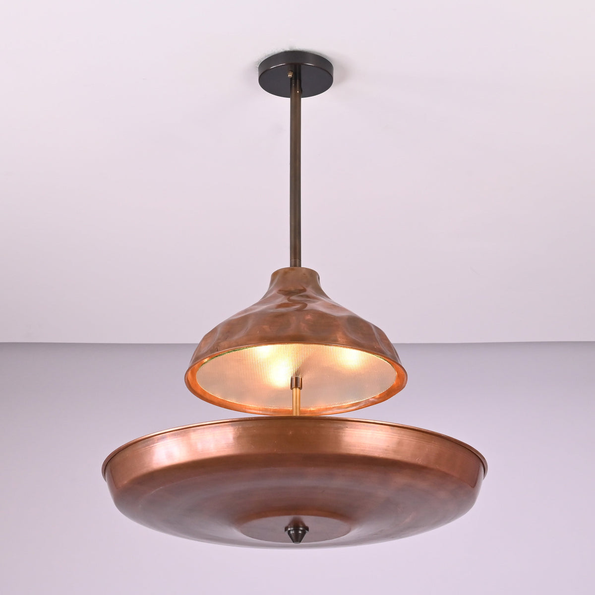 Modern industrial copper ceiling chandelier with layered disc design and premium brass construction