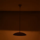 Custom brass pendant light ceiling fixture with adjustable drop length, elegant dome shade, and warm focused glow