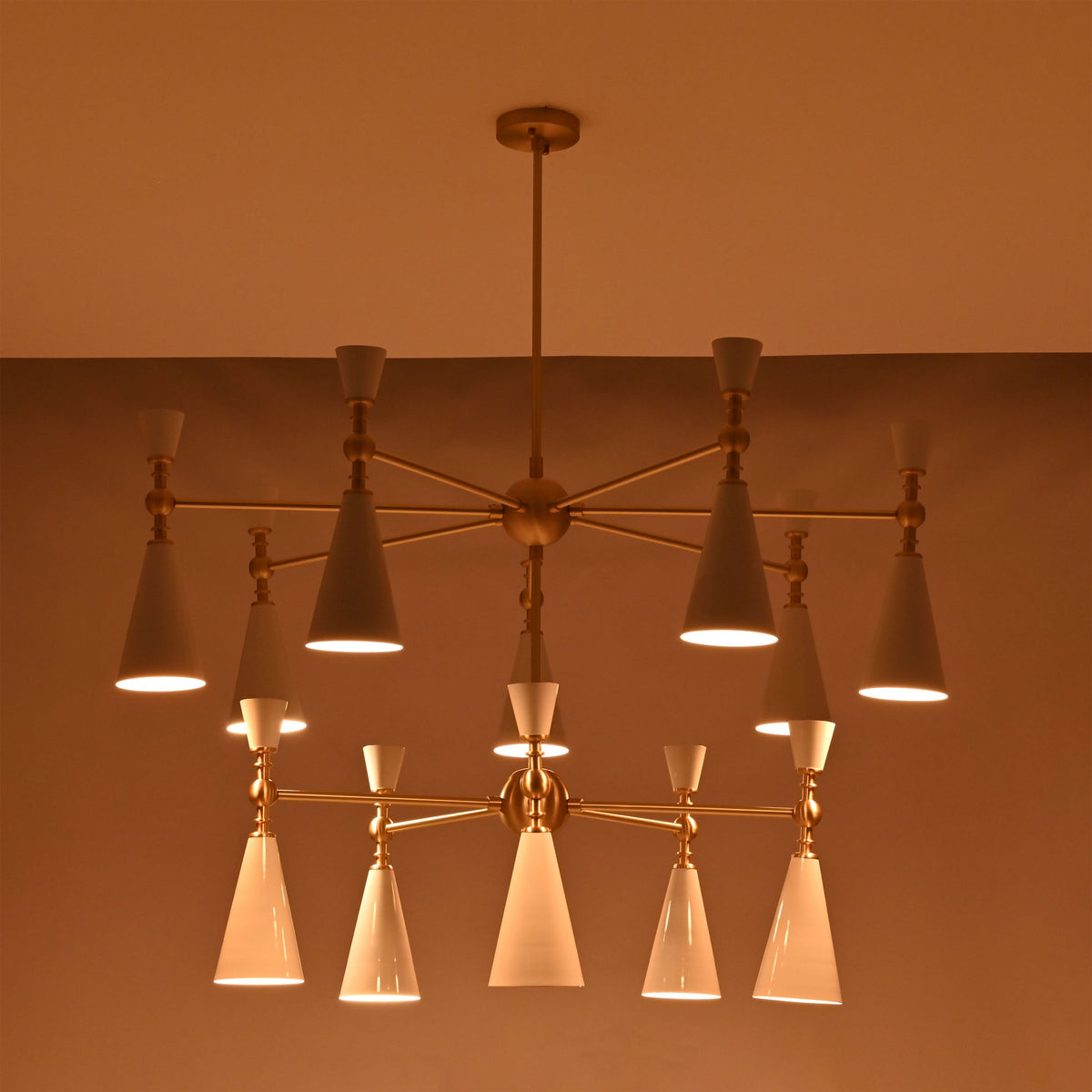 Customizable brass cone chandelier with white enamel shades, suitable for luxury homes, villas, hotels, and designer interiors