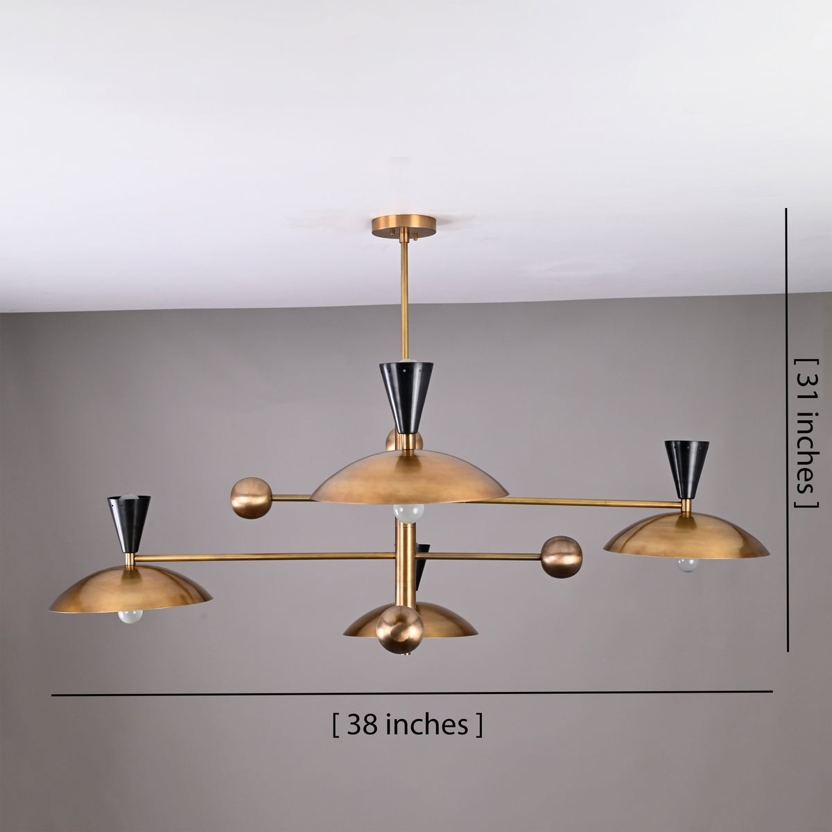 38-inch wide Diabolo brass chandelier with black cone accents showing full product dimensions and sculptural mid-century layout.