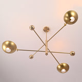Bottom view of disc style brass chandelier highlighting balanced geometry and bowl shades