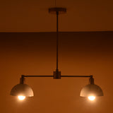 Two-light modern ceiling fixture in brushed brass and white dome shades, handcrafted for warm ambient lighting