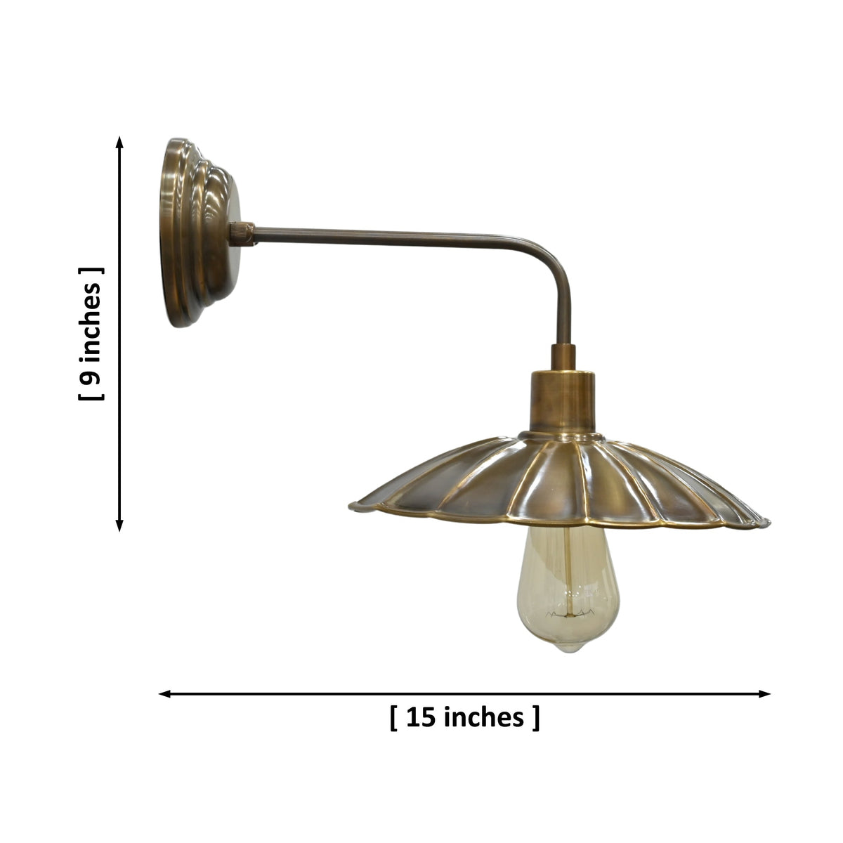 Florence brass patina scalloped wall sconce made from full brass with warm Edison-style glow