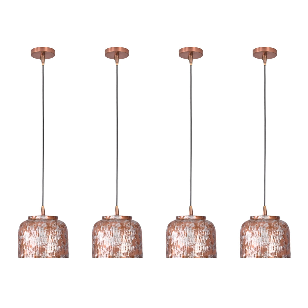 Four copper drum pendant lights installed in a row above a kitchen island for balanced illumination