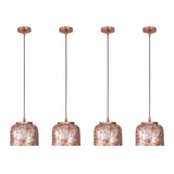 Four copper drum pendant lights installed in a row above a kitchen island for balanced illumination