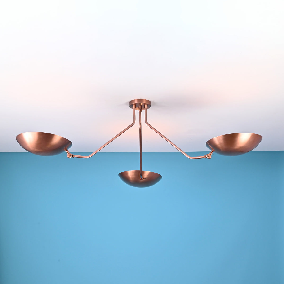 Handcrafted solid brass 3 light flush mount ceiling fixture with sculpted bowl shades and balanced linear form