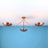 Handcrafted solid brass 3 light flush mount ceiling fixture with sculpted bowl shades and balanced linear form