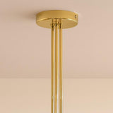 Handcrafted brass ceiling canopy and rod detail of a mid-century modern bowl glass chandelier