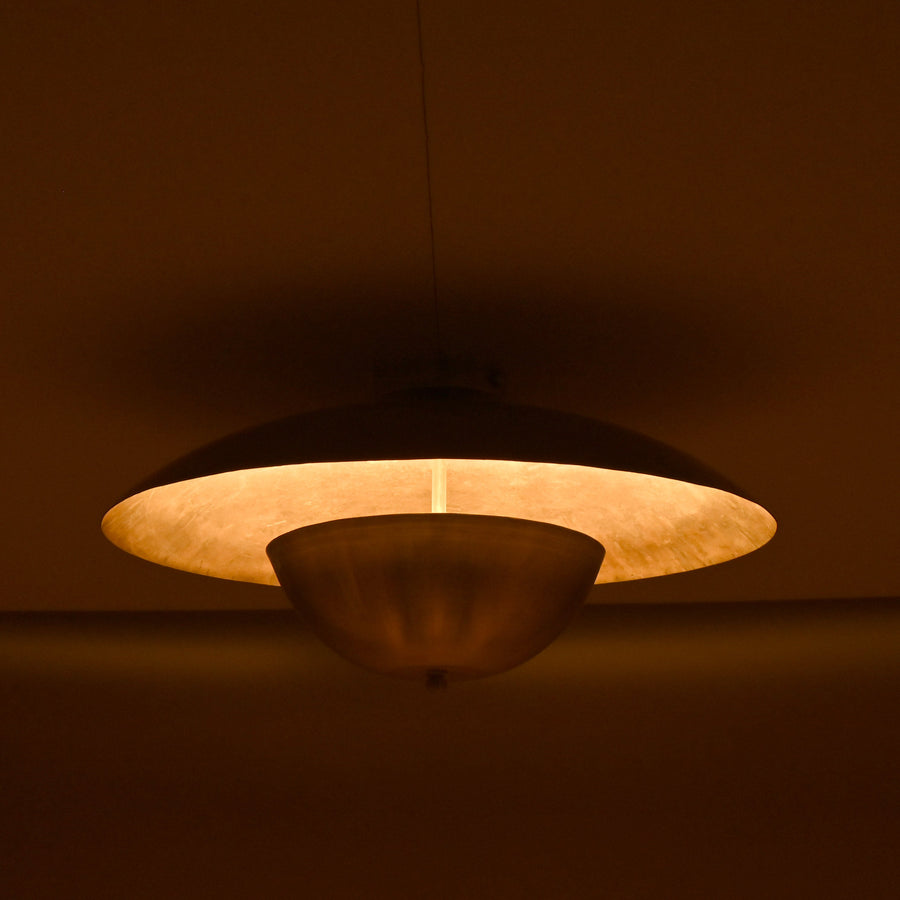Handmade brass disc flush mount light featuring dual bowl structure with polished brass finish for modern interiors