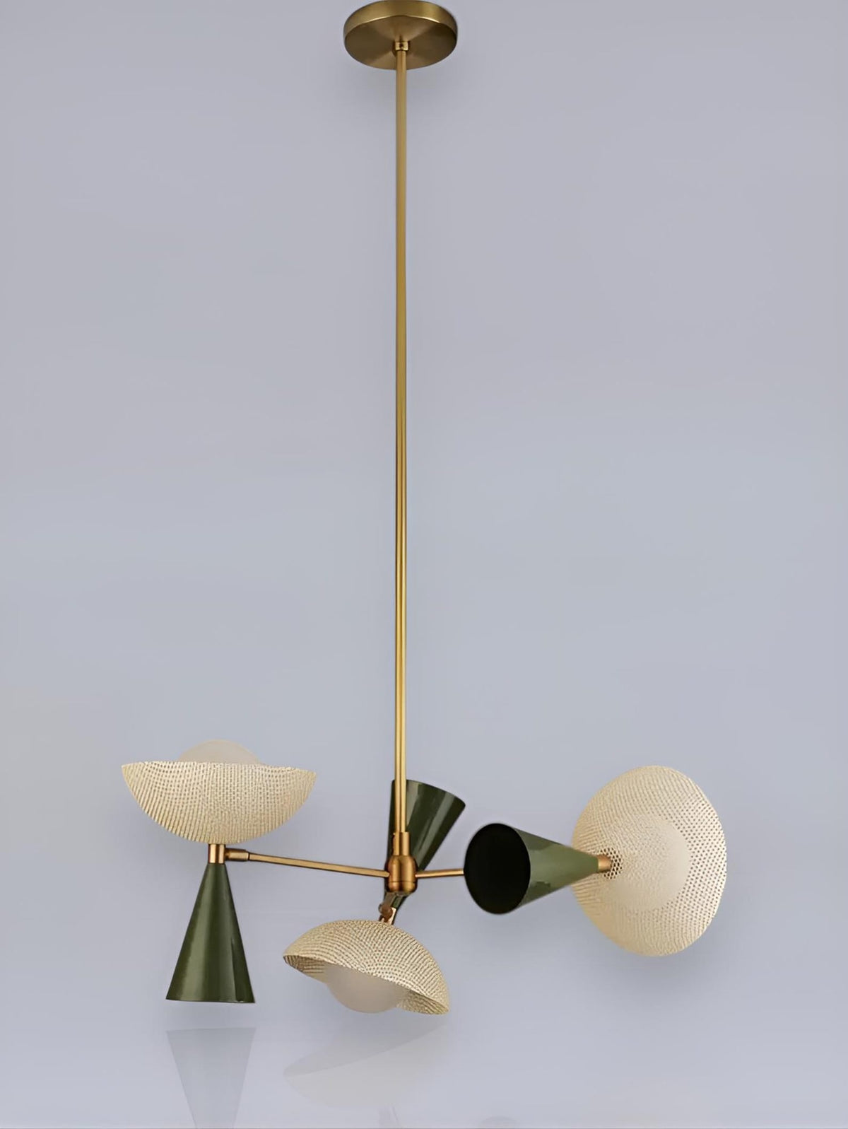 Side angle view of handcrafted Diabolo style brass chandelier with textured glass bowl shades