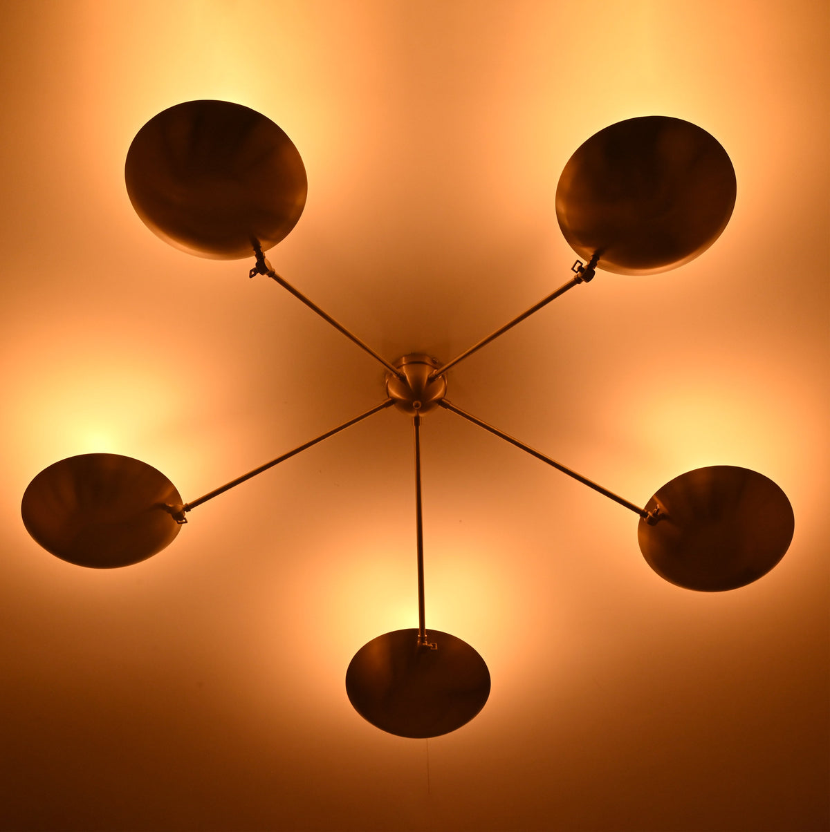 Close-up detail of handmade brass bowl chandelier highlighting premium brass finish and craftsmanship.