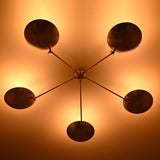 Close-up detail of handmade brass bowl chandelier highlighting premium brass finish and craftsmanship.