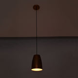 Hudson Hammered Copper Bell Pendant Light displaying warm ambient illumination with handcrafted hammered copper finish.