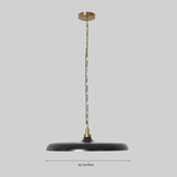 Modern industrial brass pendant light with black dome shade and gold interior finish by Brass Leaf Studio
