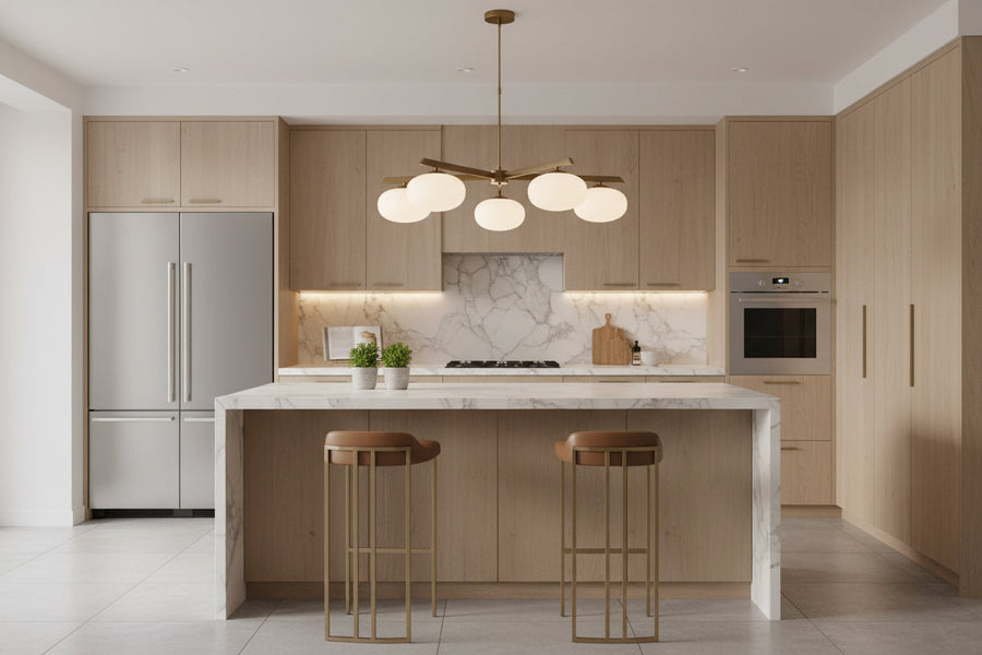 Brass linear chandelier with five oval opal glass balls arranged on a sculptural ceiling frame