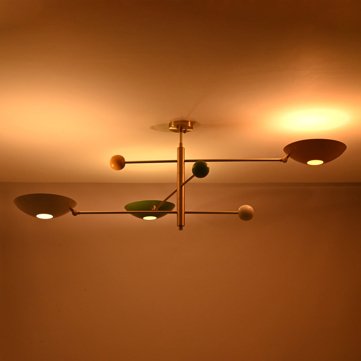 Low profile three light brass flush mount ceiling light ideal for modern interiors and low ceilings