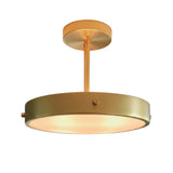Marlow Modern Drum Semi Flush Mount Ceiling Light 20 Inch Model 33250 in satin brass finish with warm illuminated frosted diffuser.