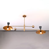 Side angle of mid-century inspired Diabolo chandelier featuring two wide brass shades and sculptural cone details.