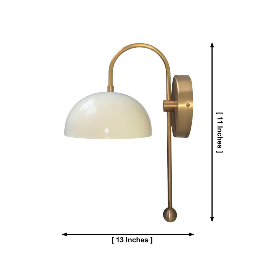 Milan curved arm dome wall sconce installed above bathroom vanity with warm ambient lighting – Model 32775
