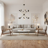 Milan Noir 16 light starburst chandelier featuring sculptural black cone shades and warm brass arms – angled view