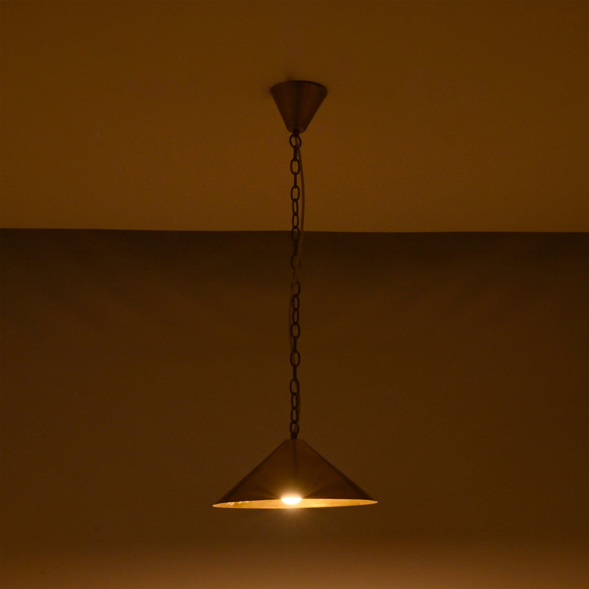 Minimal brass cone ceiling light with chain suspension designed for hallway, kitchen, dining, and bedroom spaces