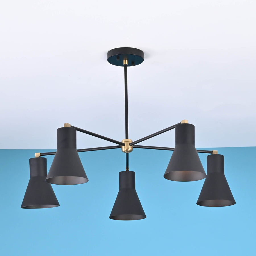 Modern 5 cone brass chandelier with black metal arms and minimalist industrial ceiling design