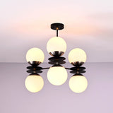 Modern brass disc chandelier with six opal glass globes, sculptural ceiling light by Brass Leaf Studio