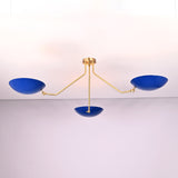 Symmetrical brass disc style flush mount ceiling light featuring three blue bowl shaped shades