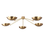 Modern brass flushmount chandelier with five bowl-shaped shades designed for warm ambient ceiling lighting.